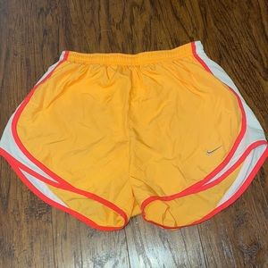 NIKE Dri-Fit orange athletic shorts
